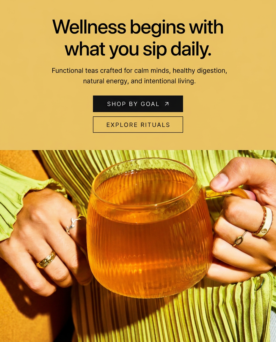 Hands holding a glass mug of tea